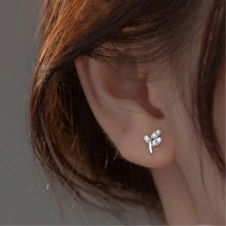 Sterling silver earrings in the shape of a minimalist leaf