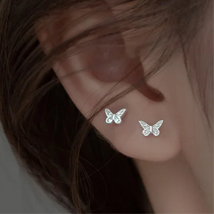 Sterling silver earrings in the shape of a mini butterfly