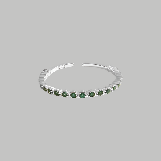 Minimalistic adjustable size sterling silver ring decorated with green zircon crystals