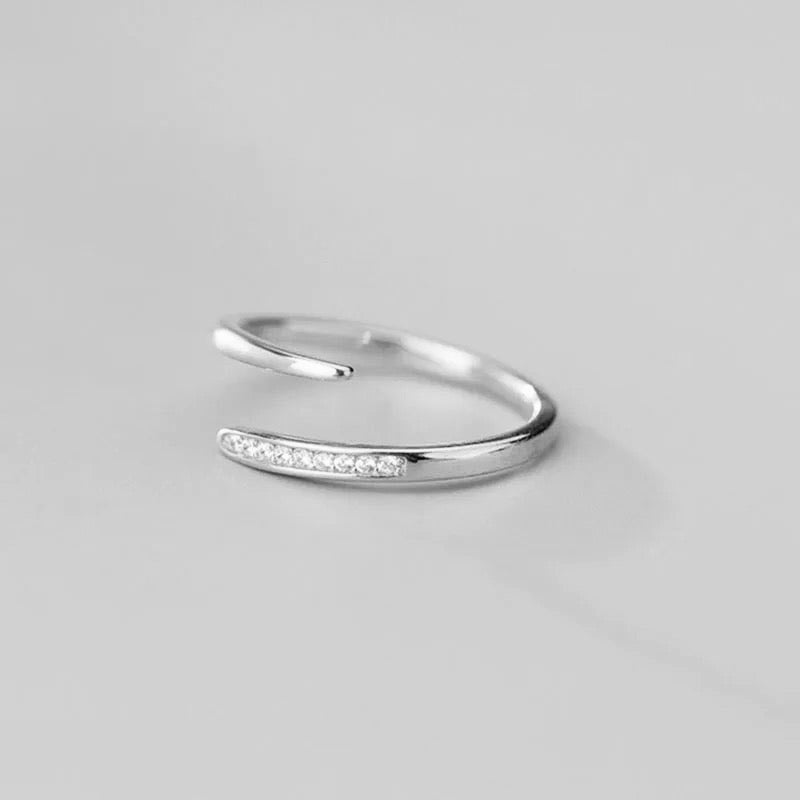 Minimalist sterling silver ring with zirconia crystals