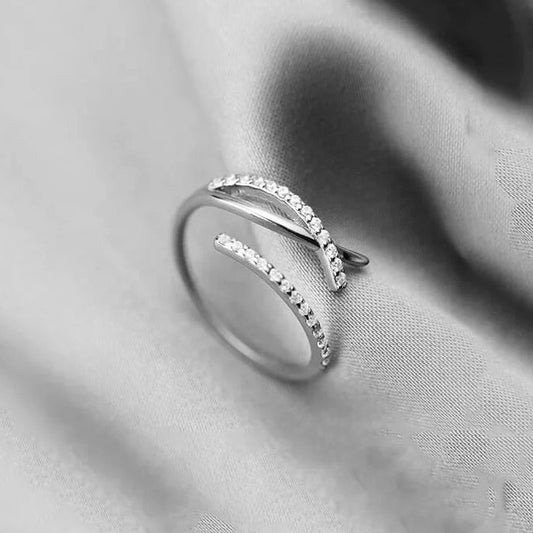 Twisted sterling silver ring with zirconia crystals