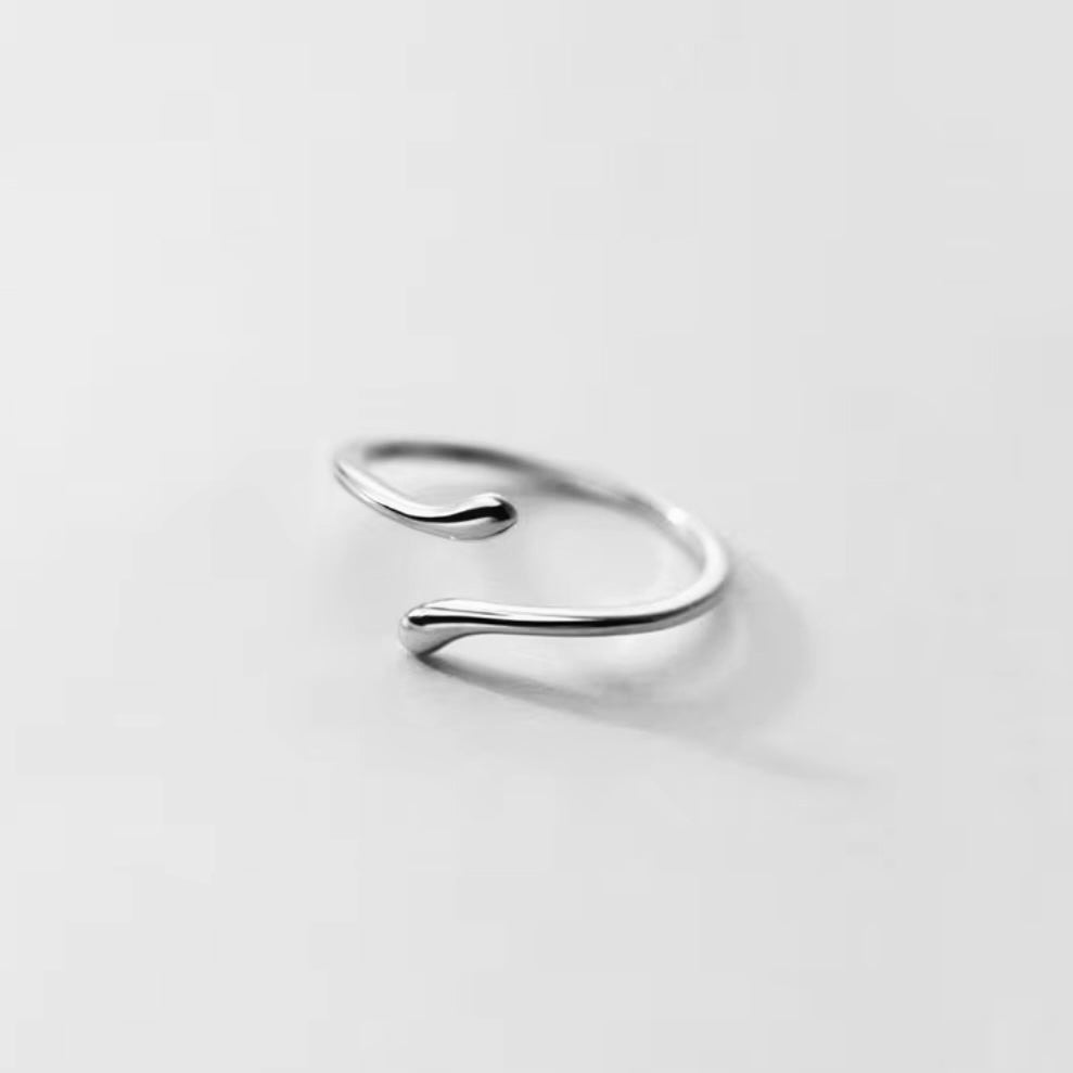 Extra thin wave-shaped sterling silver ring