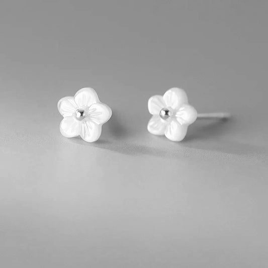 Sterling silver earrings in the shape of a mini flower