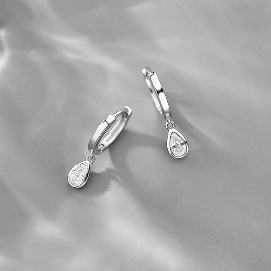 Drop-shaped sterling silver earrings with zircon crystal