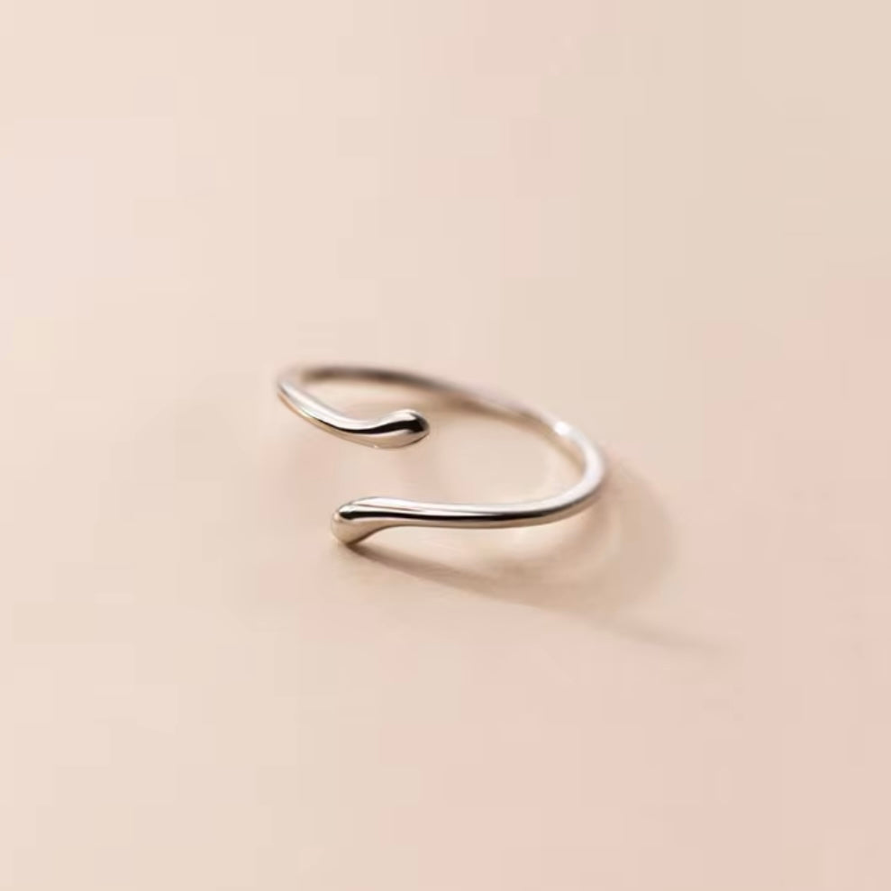 Extra thin wave-shaped sterling silver ring