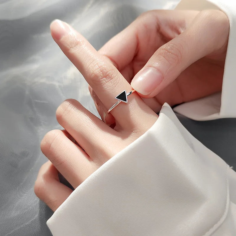 A special silver ring in the shape of a triangle