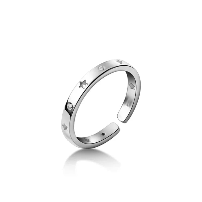 Sterling silver adjustable size ring with a star pattern