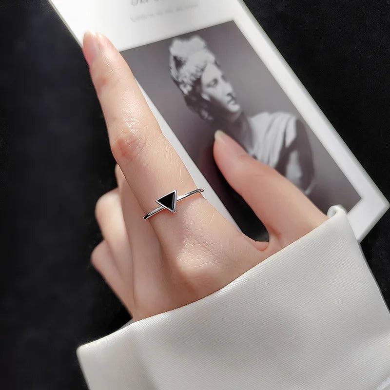 A special silver ring in the shape of a triangle