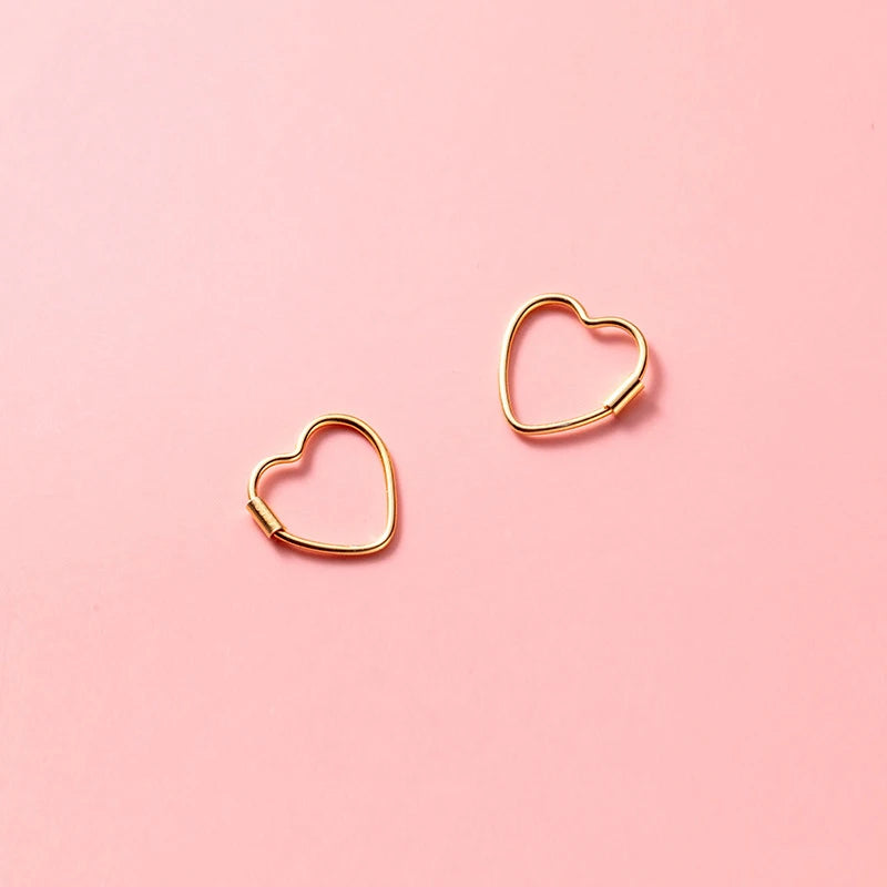 Heart-shaped sterling silver earrings