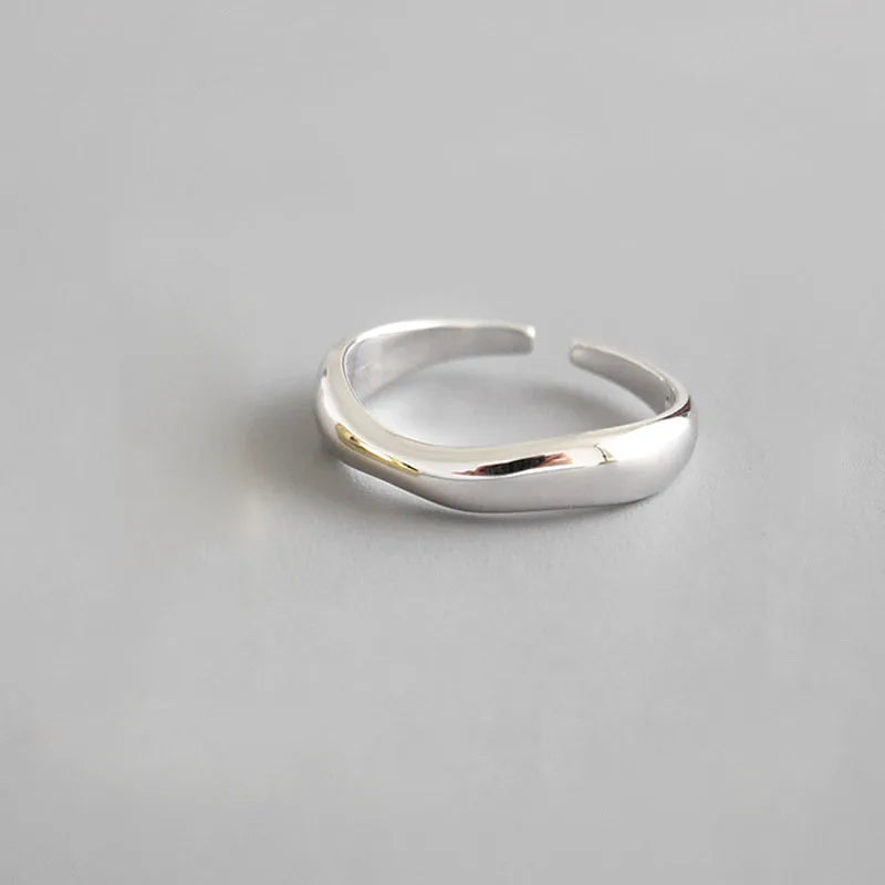 Wave effect sterling silver ring with adjustable size