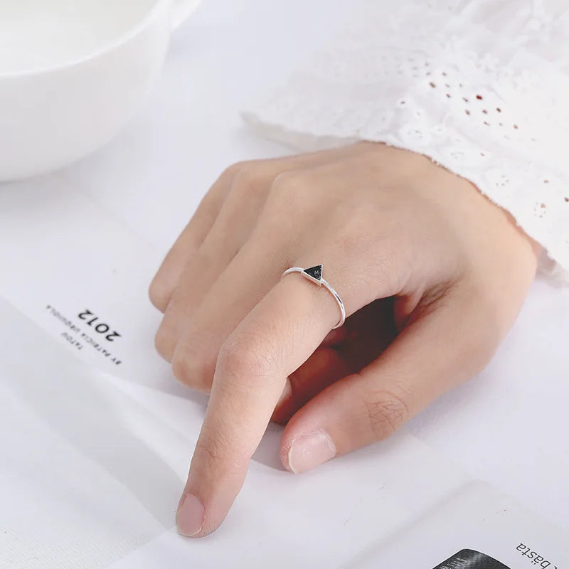 A special silver ring in the shape of a triangle