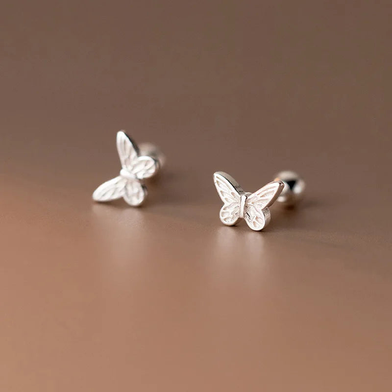 Sterling silver earrings in the shape of a mini butterfly