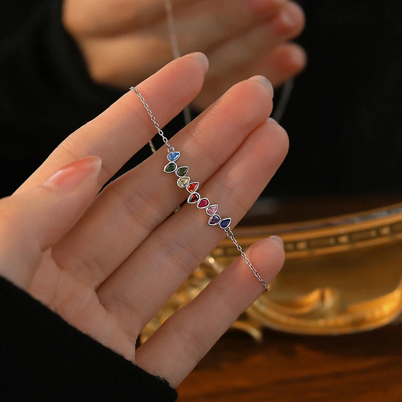 Sterling silver bracelet with colored cubic zirconia stones