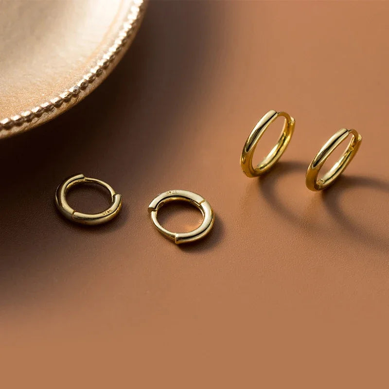 Minimalist sterling silver hoop earrings in several sizes