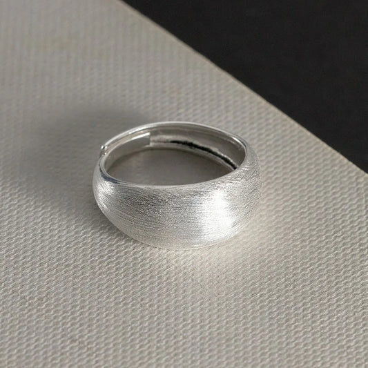 Minimalist sterling silver adjustable size ring with an ice effect