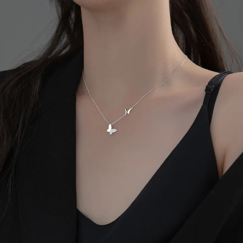 Minimalist sterling silver necklace in the shape of a butterfly