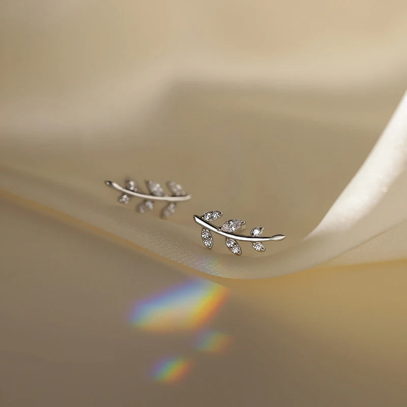 Sterling silver earrings in the shape of a tree branch