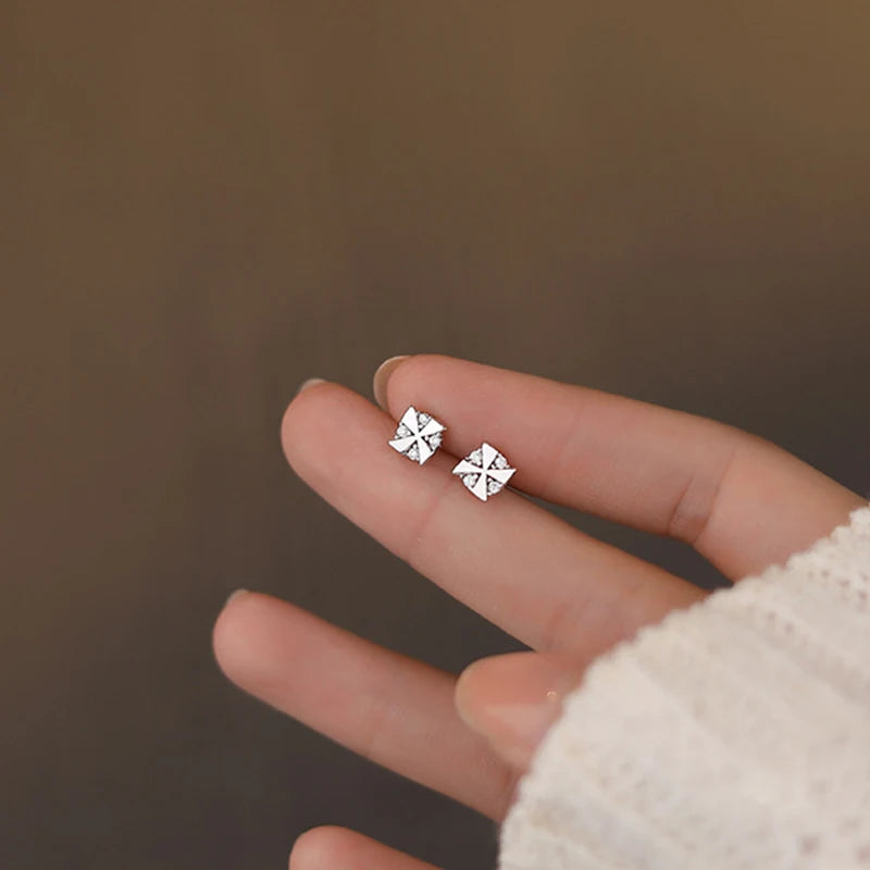 Sterling silver earrings in the shape of a windmill