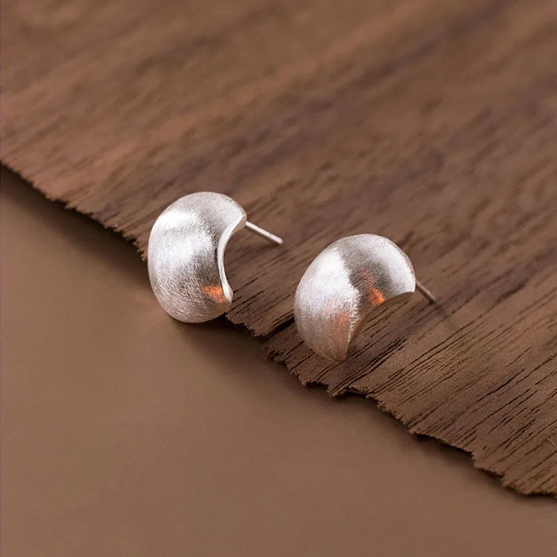 Sterling silver minimalist earrings with an ice effect