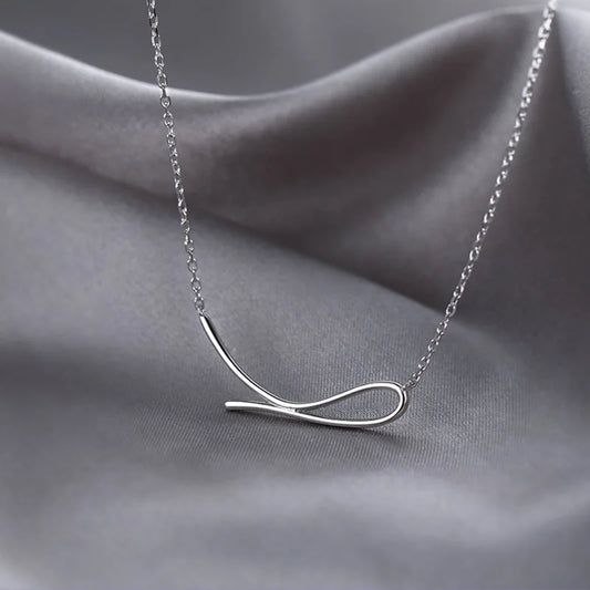 Minimalist wave shaped sterling silver necklace