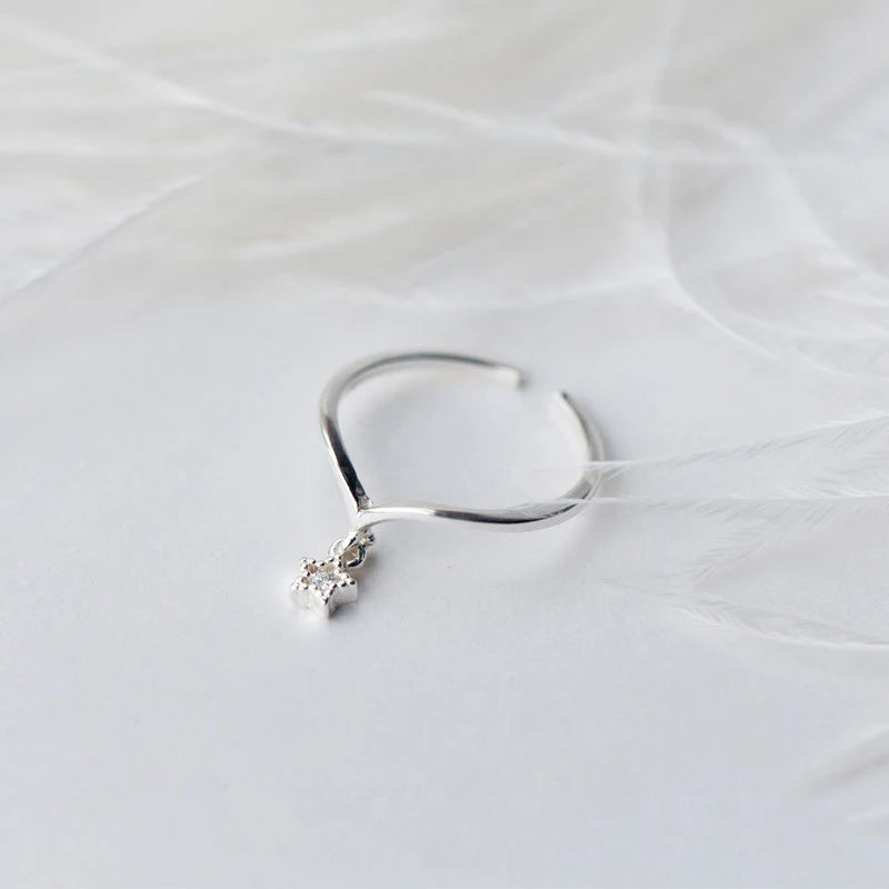 Special adjustable size sterling silver ring in the shape of a star