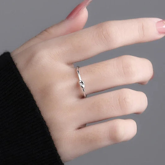 Knot-shaped sterling silver adjustable size ring