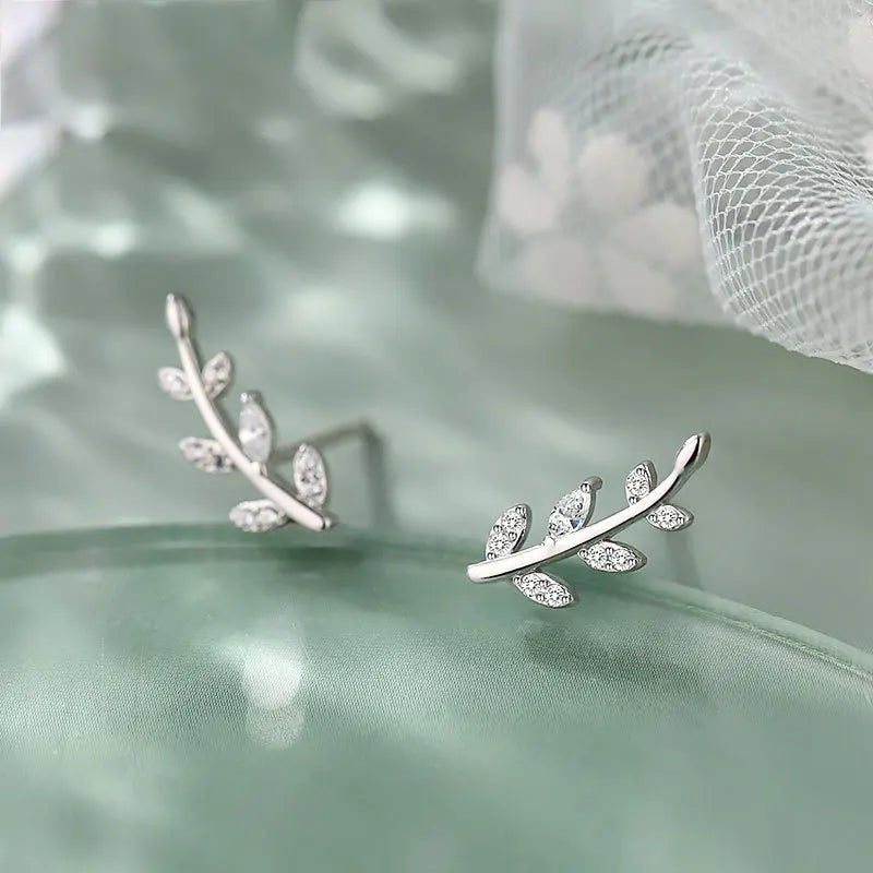 Sterling silver earrings in the shape of a tree branch