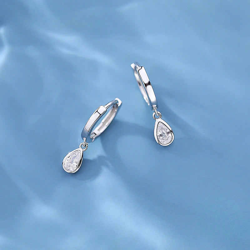 Drop-shaped sterling silver earrings with zircon crystal