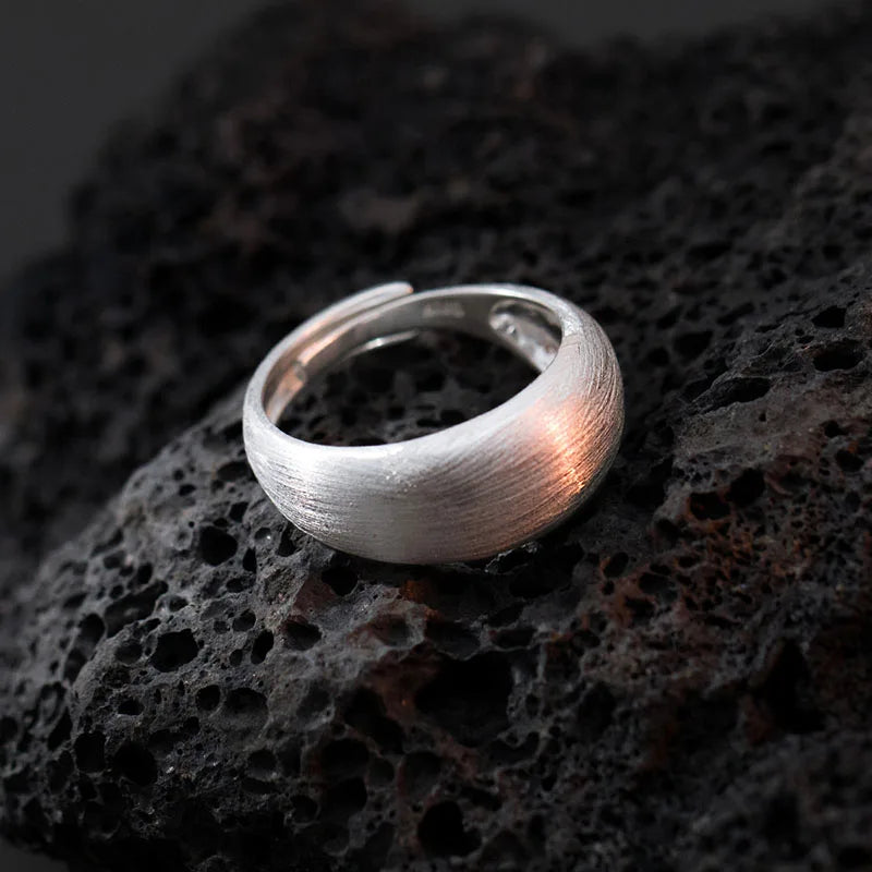 Minimalist sterling silver adjustable size ring with an ice effect