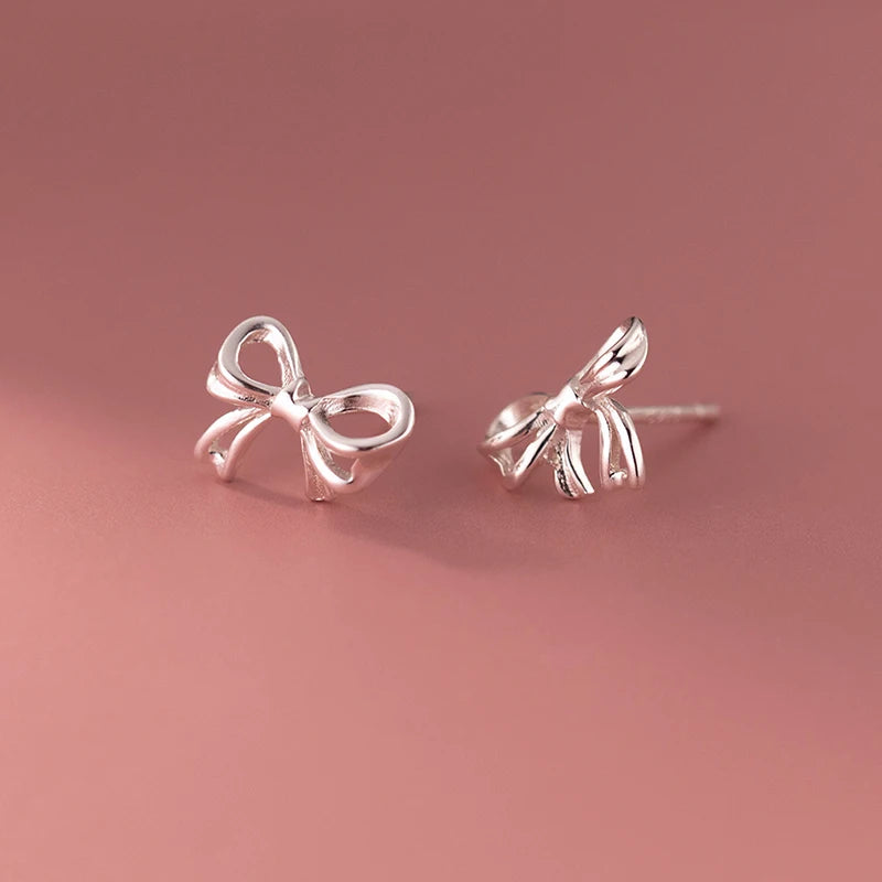 Bow-shaped sterling silver earrings