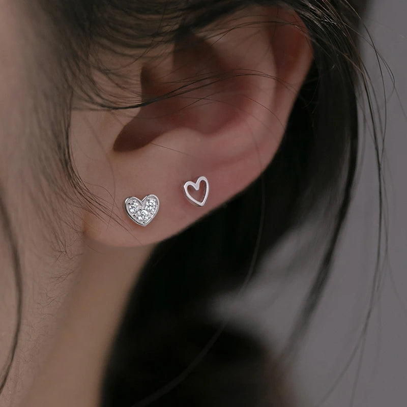 Mini heart-shaped sterling silver earrings with zirconia crystals