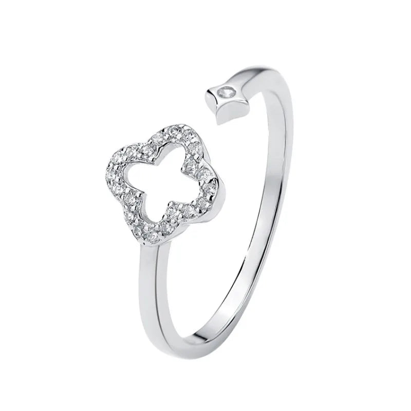 Clover-shaped shiny sterling silver ring with zircon crystals