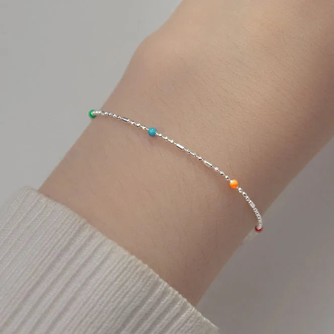 minimalist sterling silver bracelet with colored beads