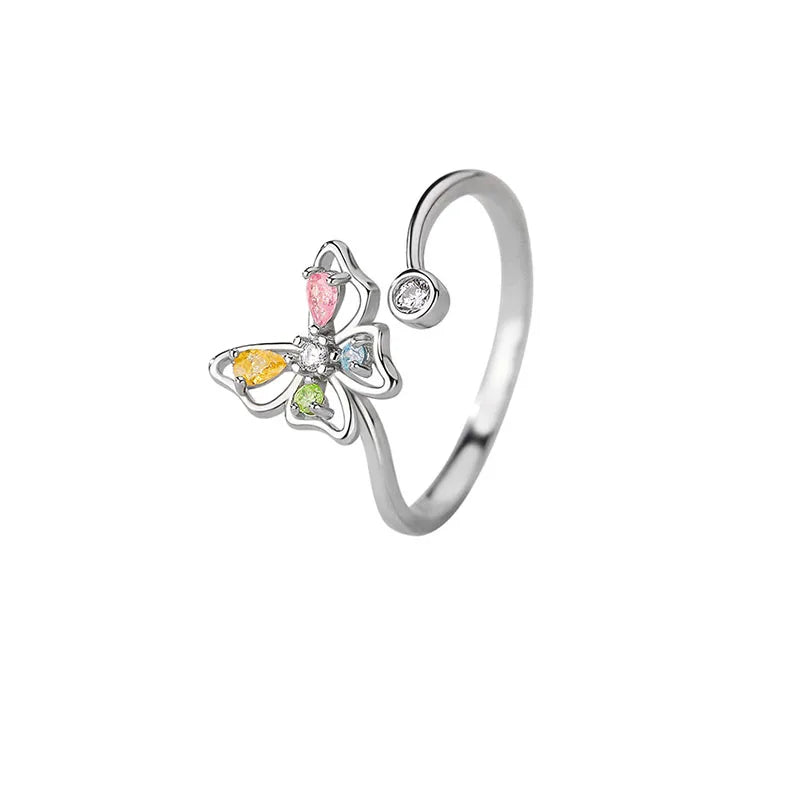 Adjustable size butterfly shaped sterling silver ring with colored zircon crystals