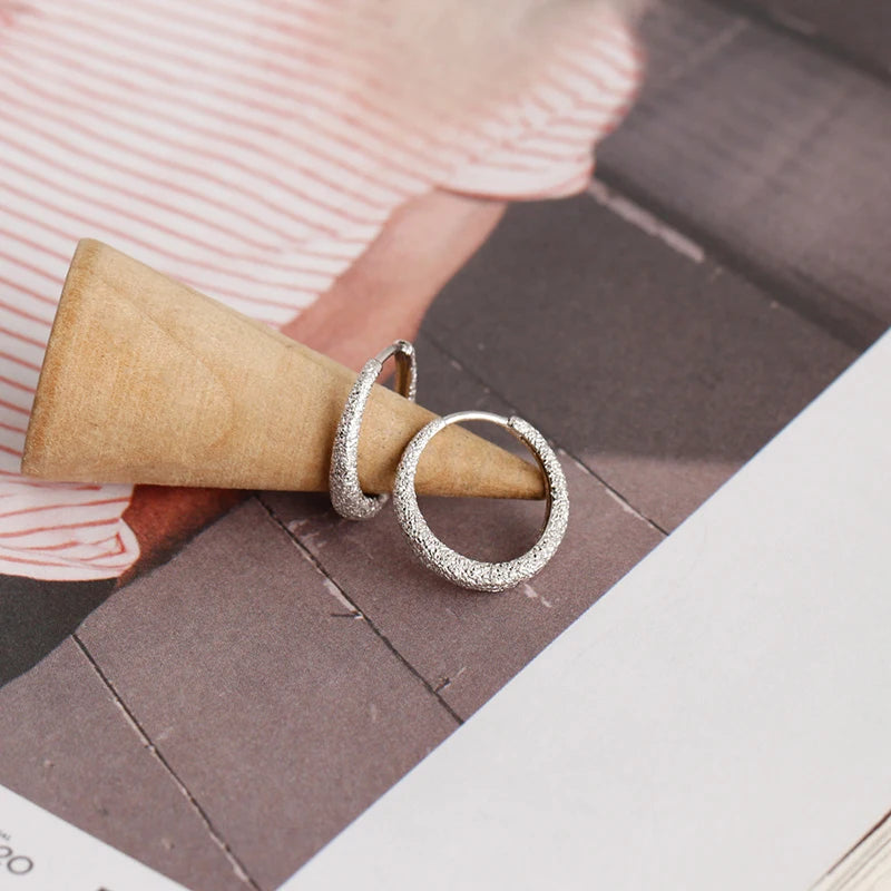 Sand effect sterling silver earrings