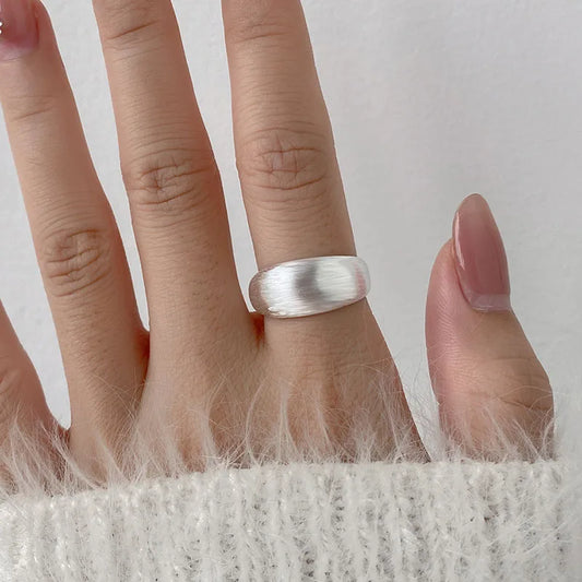 Minimalist sterling silver adjustable size ring with an ice effect