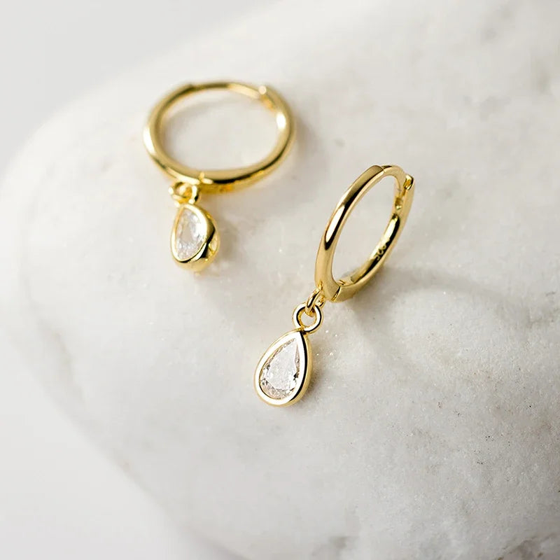 Sterling silver earrings in the shape of a sparkling water drop