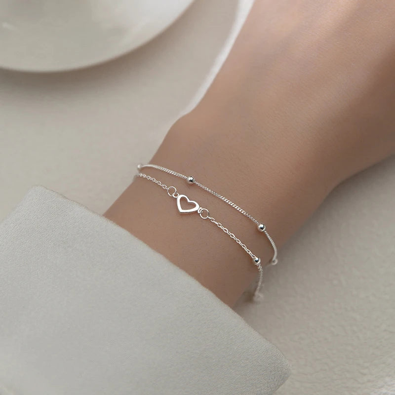 Herzförmiges Armband aus Sterlingsilber mit zwei Ketten